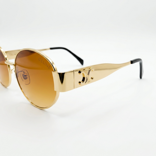 Celine 2380 Luxury Oval Sunglasses – Polished Gold Metal with Iconic Celine Triomphe Logo, Black Acetate Tips & Gradient Brown UV Protection Lenses