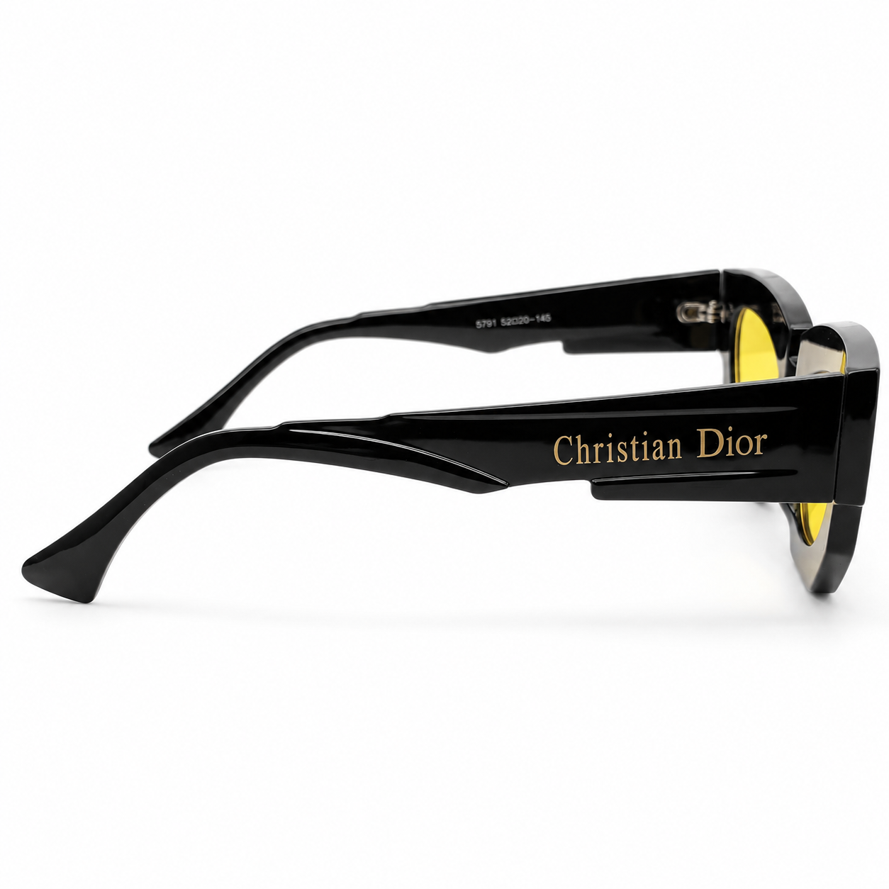 Christian Dior 5701 Luxury Bold Cat-Eye Sunglasses – Glossy Black Acetate with Gold Christian Dior Temple Branding & Yellow UV Protection Lenses