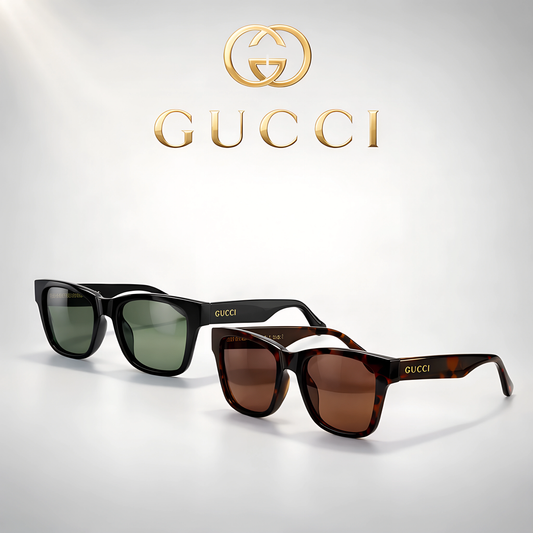 Gucci rectangular sunglasses in classic black and tortoise shell patterns with gold logo detail.